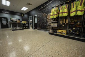 a shop room with safety jackets